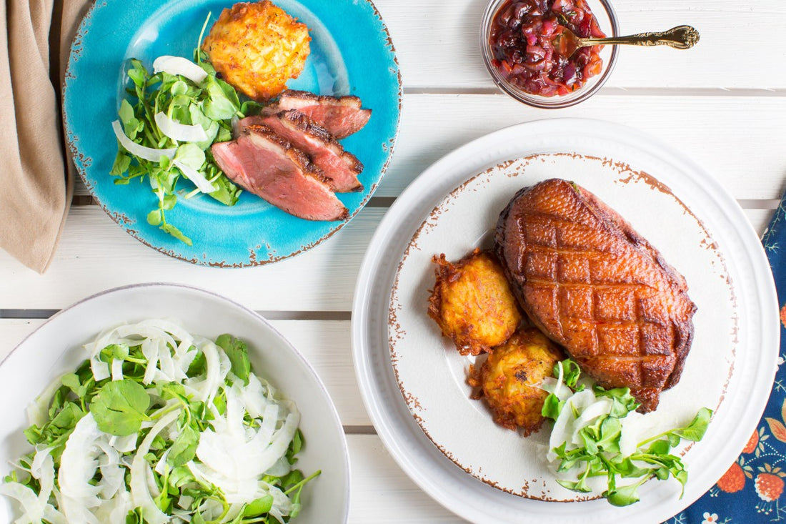 Lingonberry-Glazed Duck with Potato Pancakes and Watercress-Fennel Salad